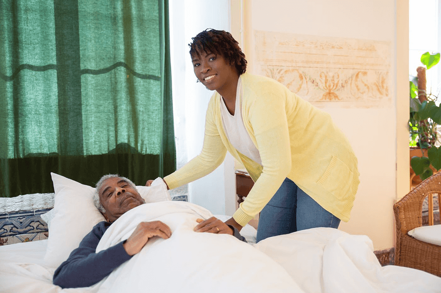 Speech therapist working with a client at home