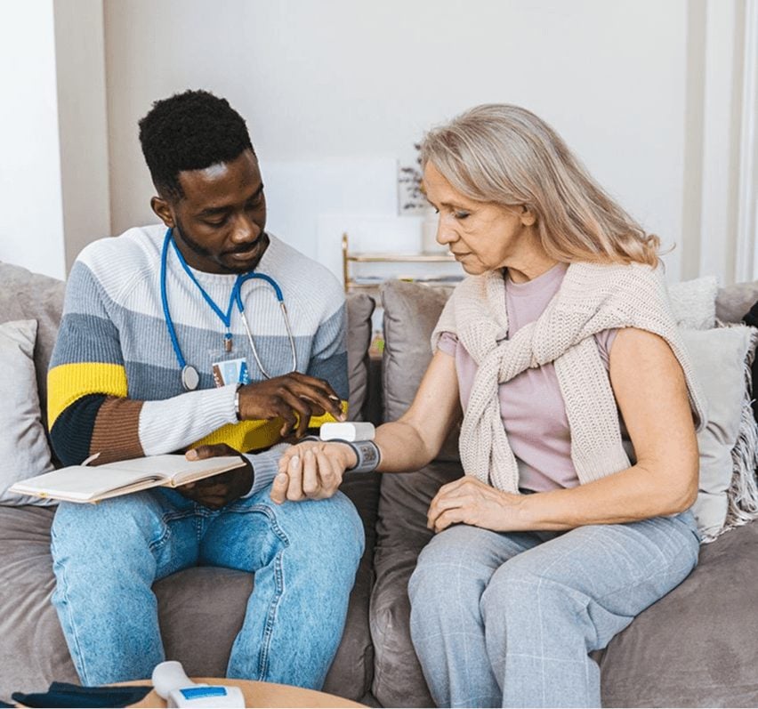 Havlon Elite nurse taking notes with a client at home